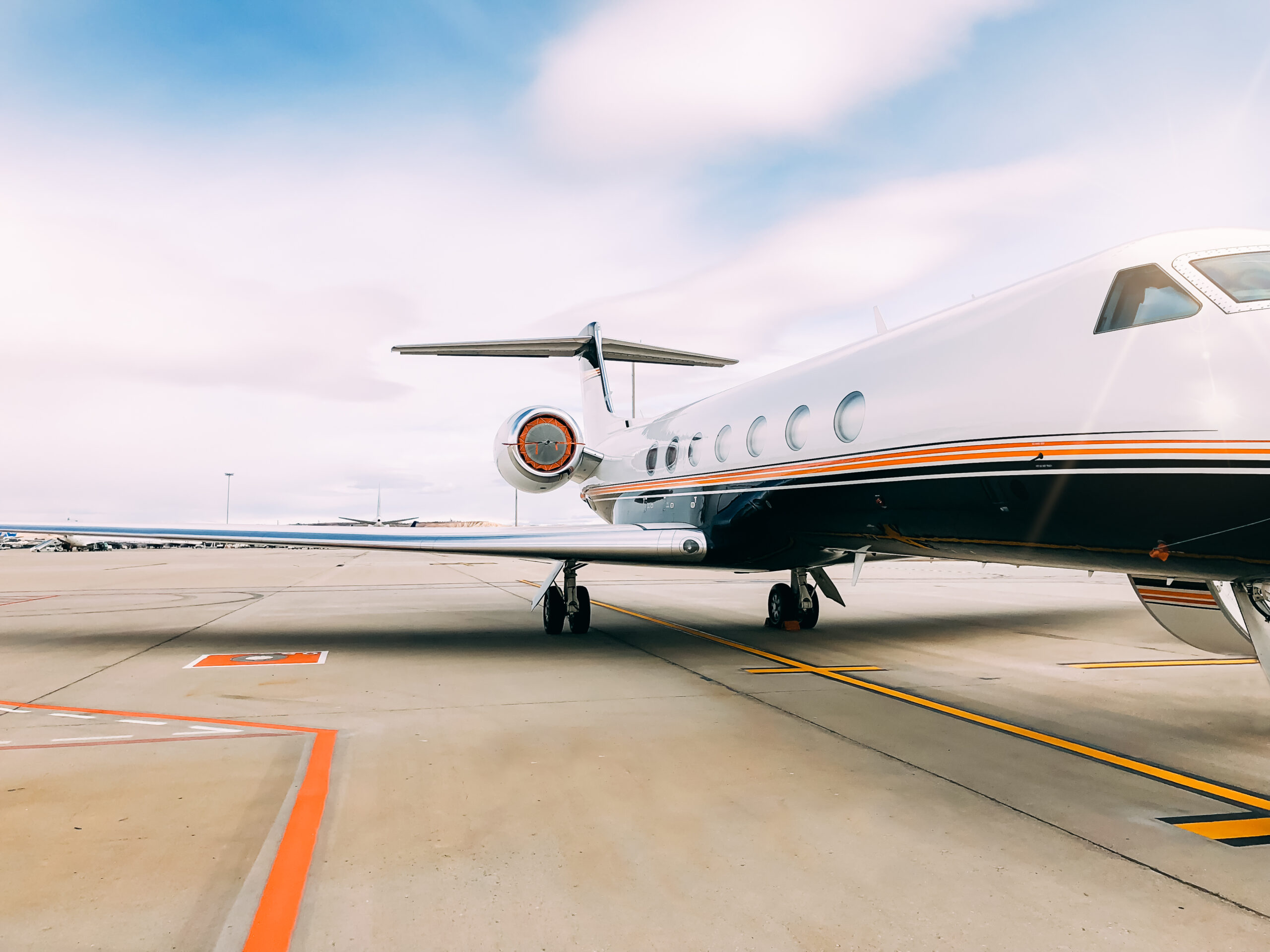 Private luxury jet at the airport terminal - Haulogis